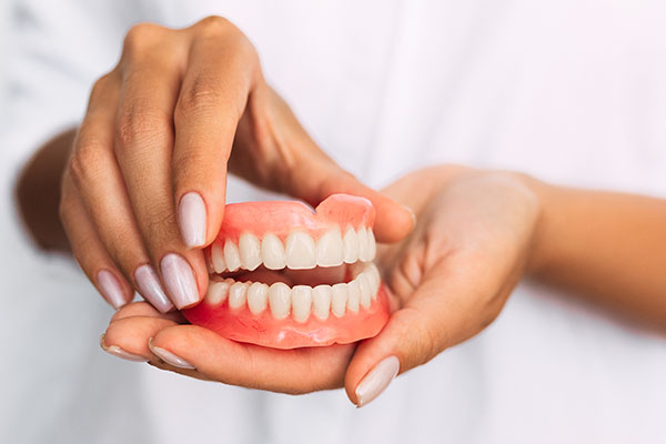 How Does A Restorative Dentist Treat Tooth Wear?